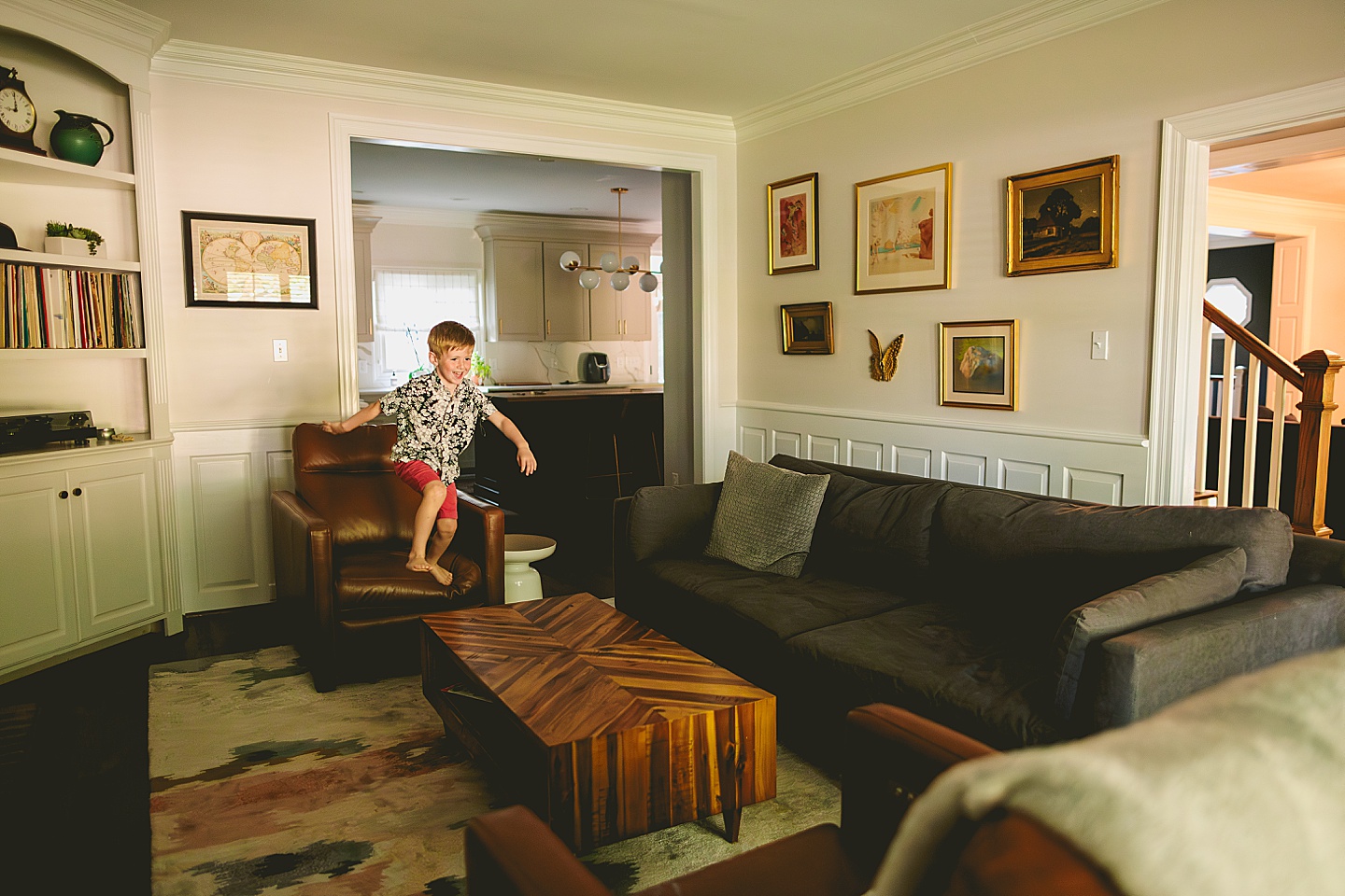 Boy pretending that the floor is made of lava