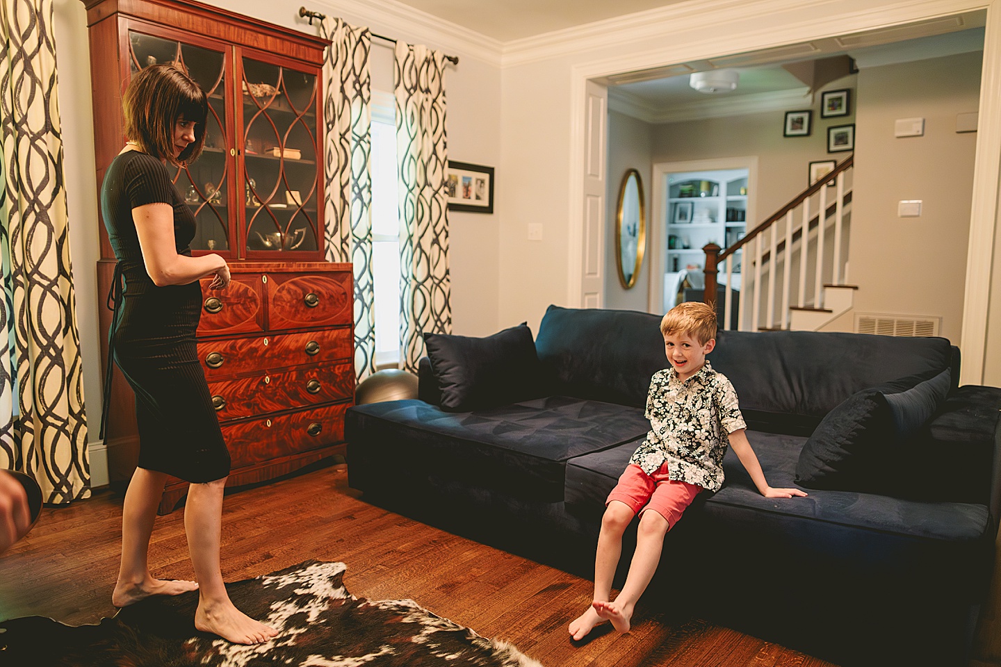 Kid goofing around with parents