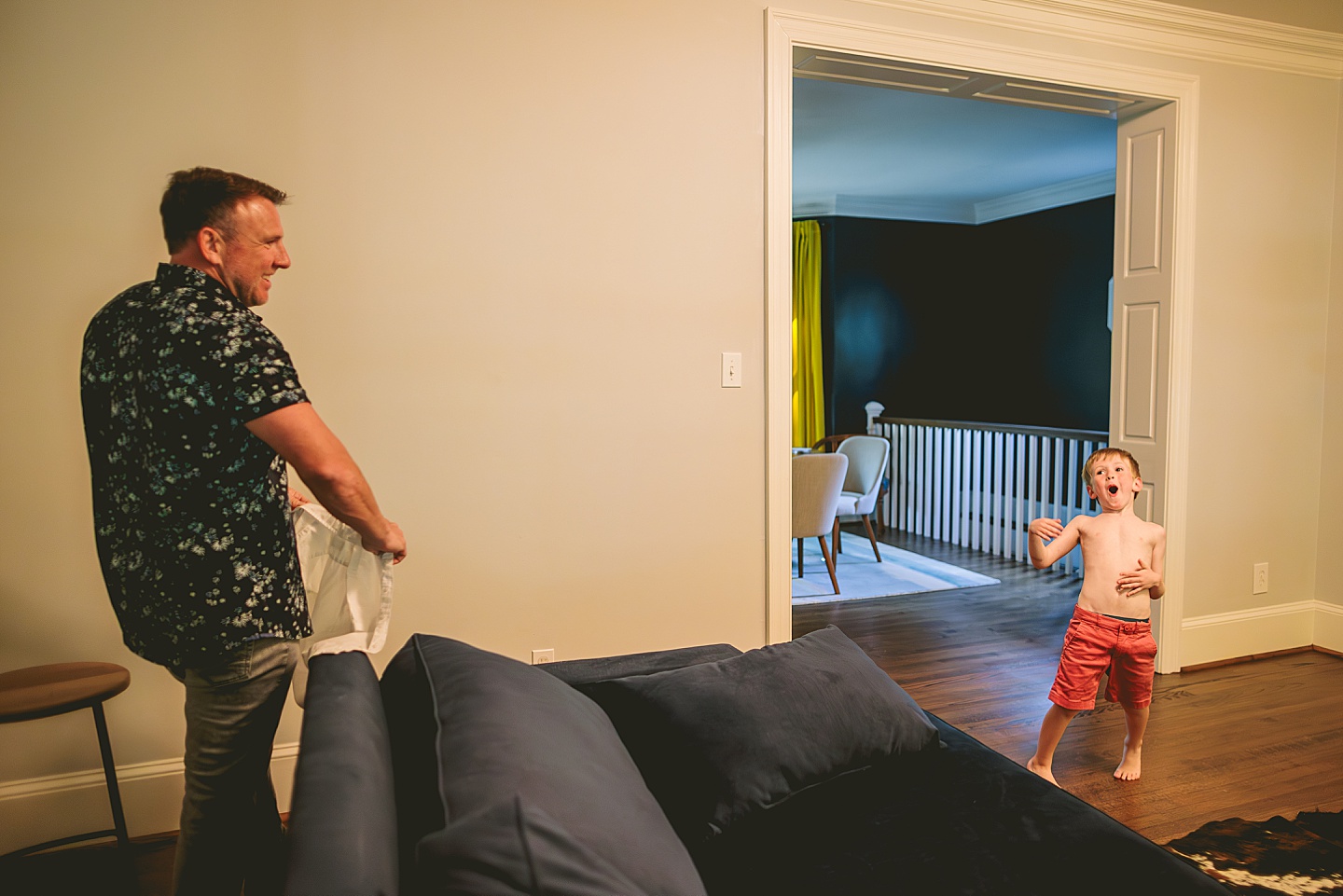 Kid goofing around in living room