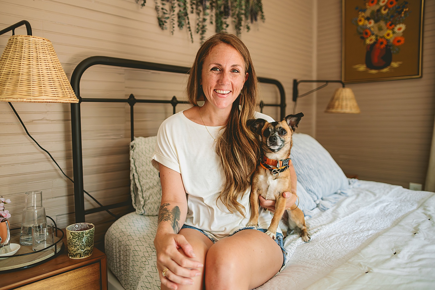 Woman smiles with dog