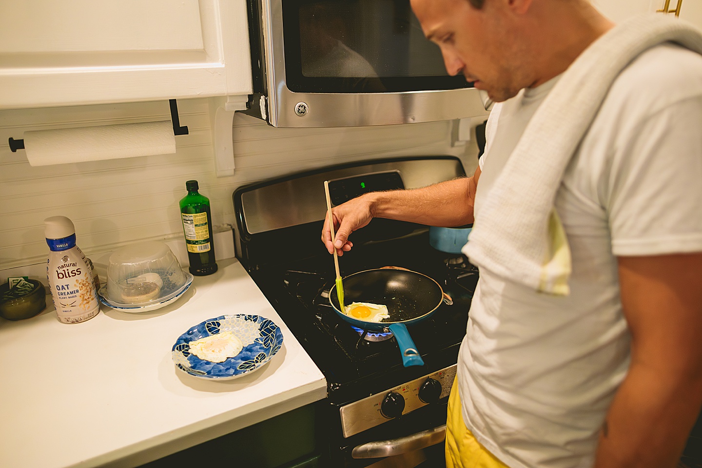 Couple cooking inside home