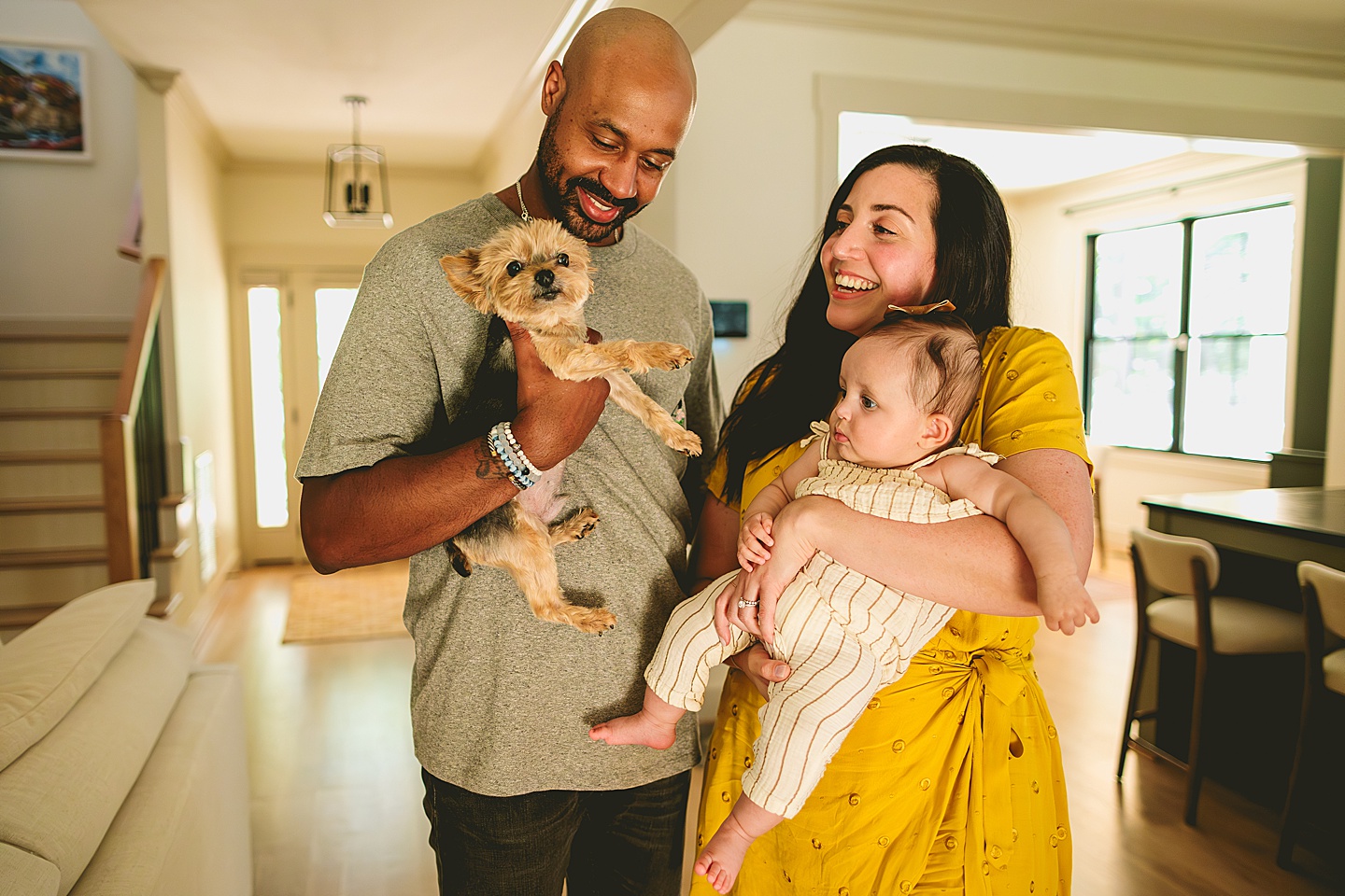 Family portrait with baby and dog