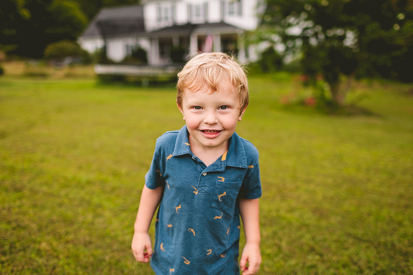 Smiling child in blue shirt