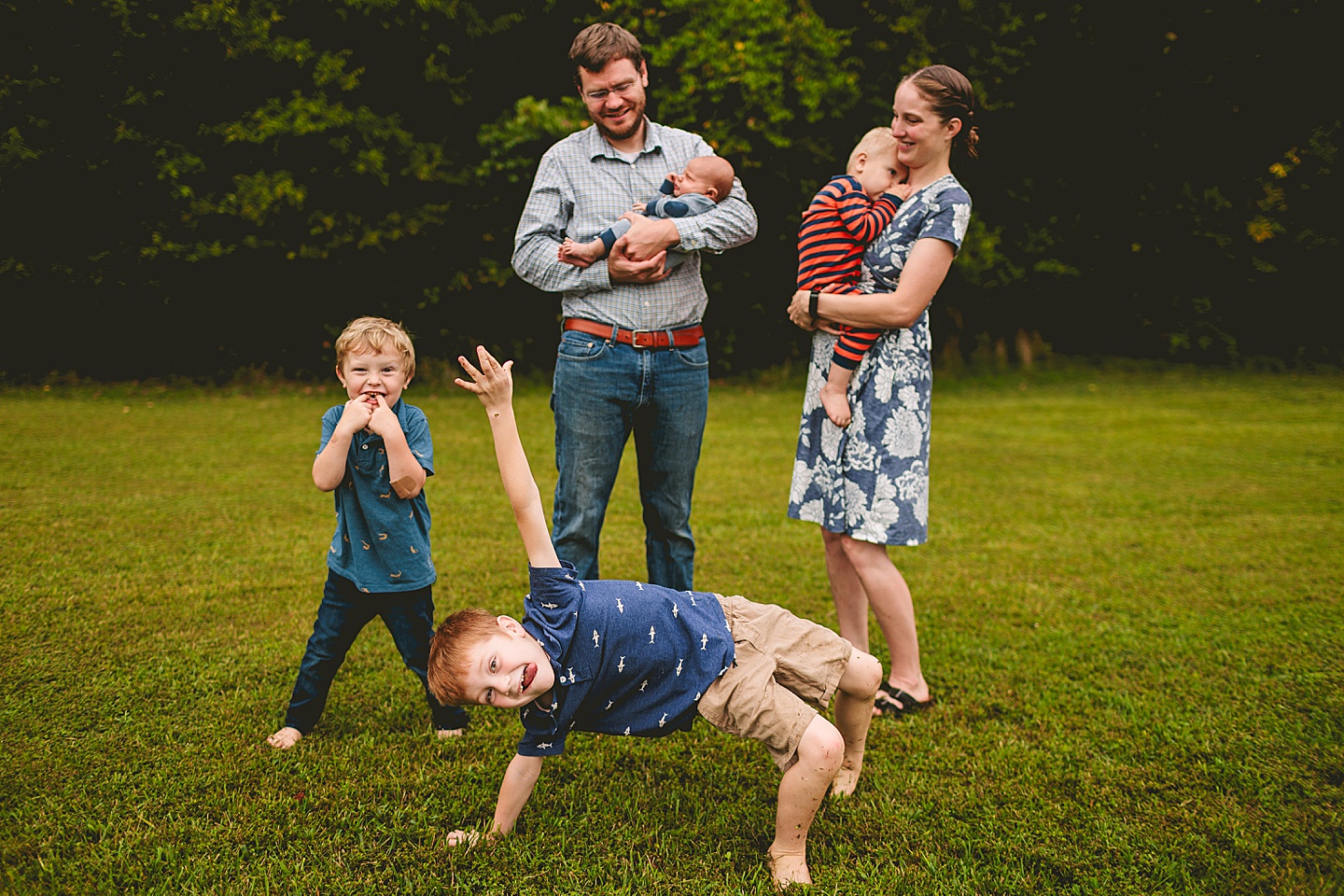 Family photo in Durham with kids doing funny things