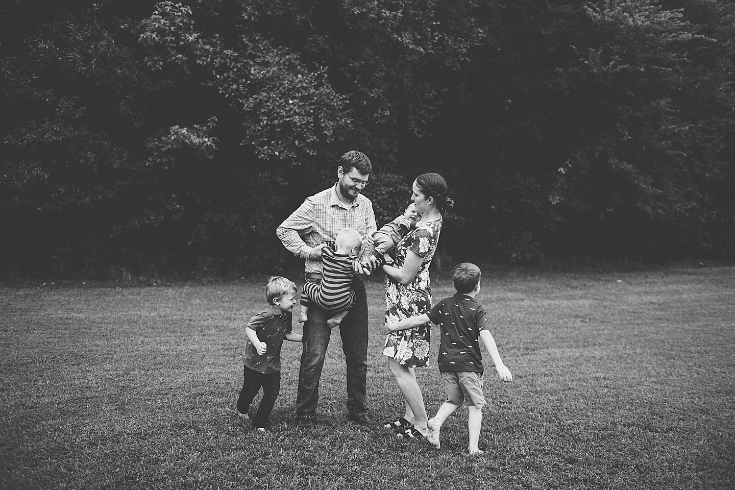 Durham family photographer with kids running around