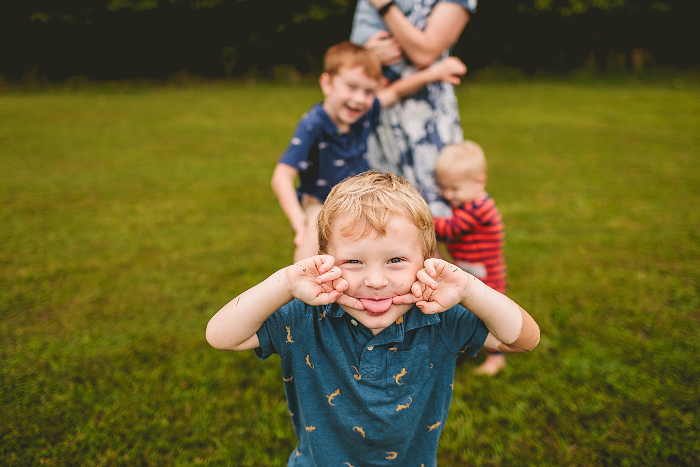 Kids goofing around during family photos at home in Durham