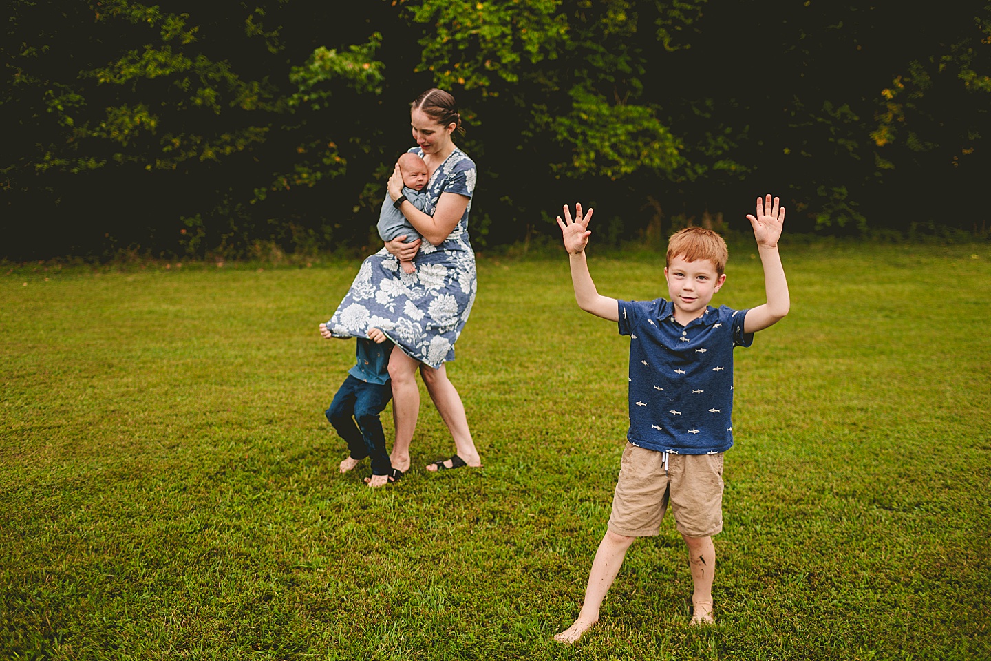 Kids goofing around during family photos at home in Durham