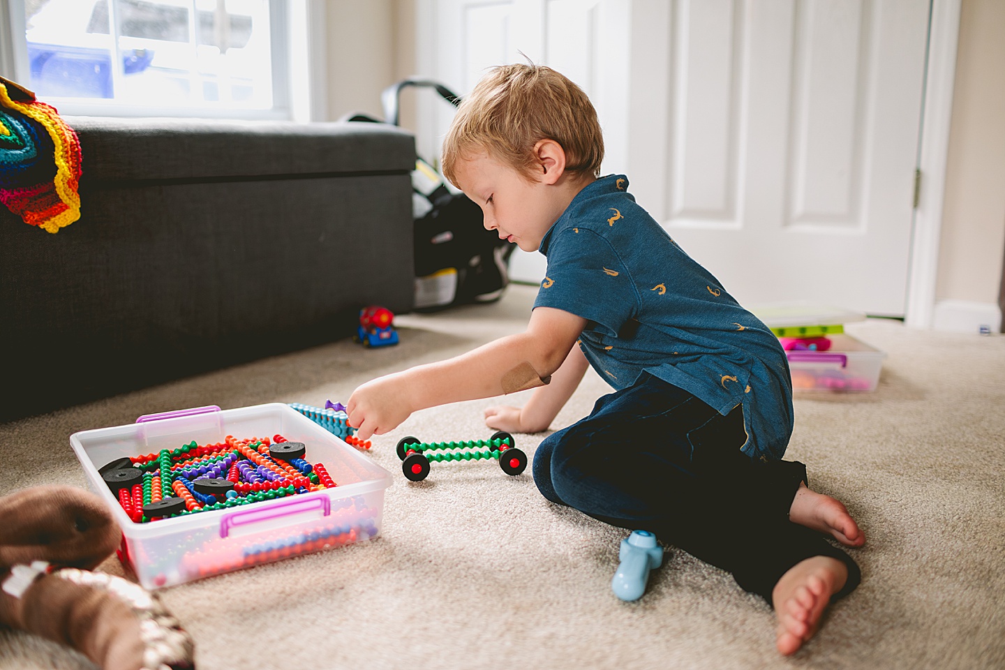 Kids putting together cars