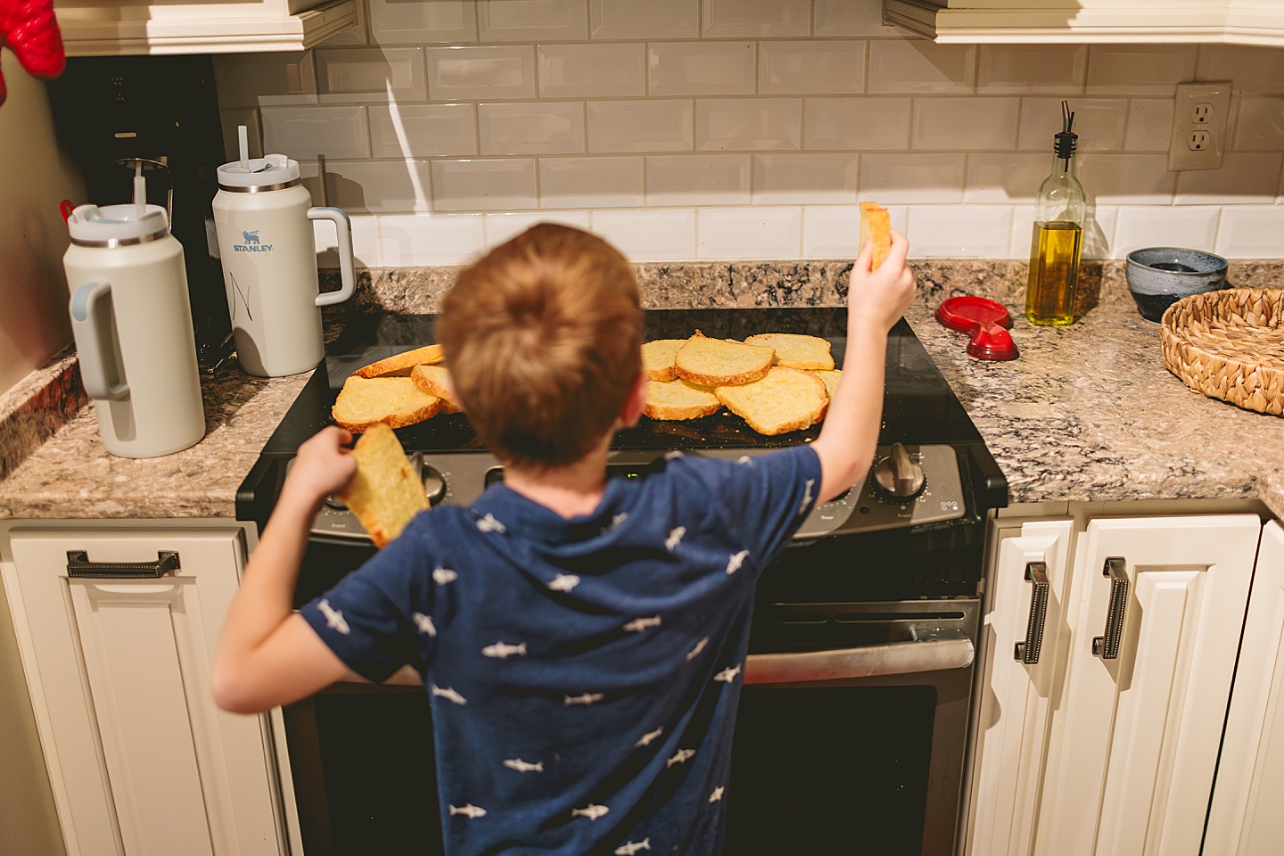 Kid playing with bread