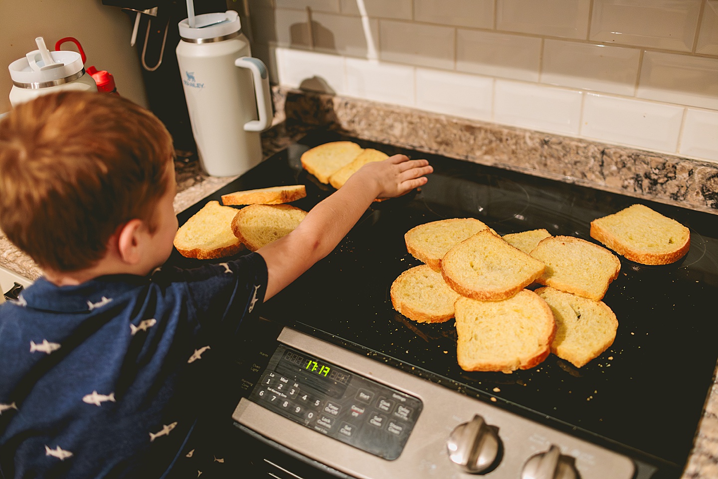 Kid playing with bread