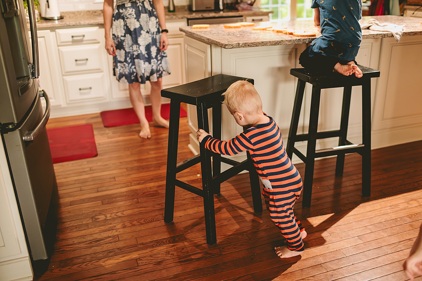 Kids in the kitchen making french toast for photos