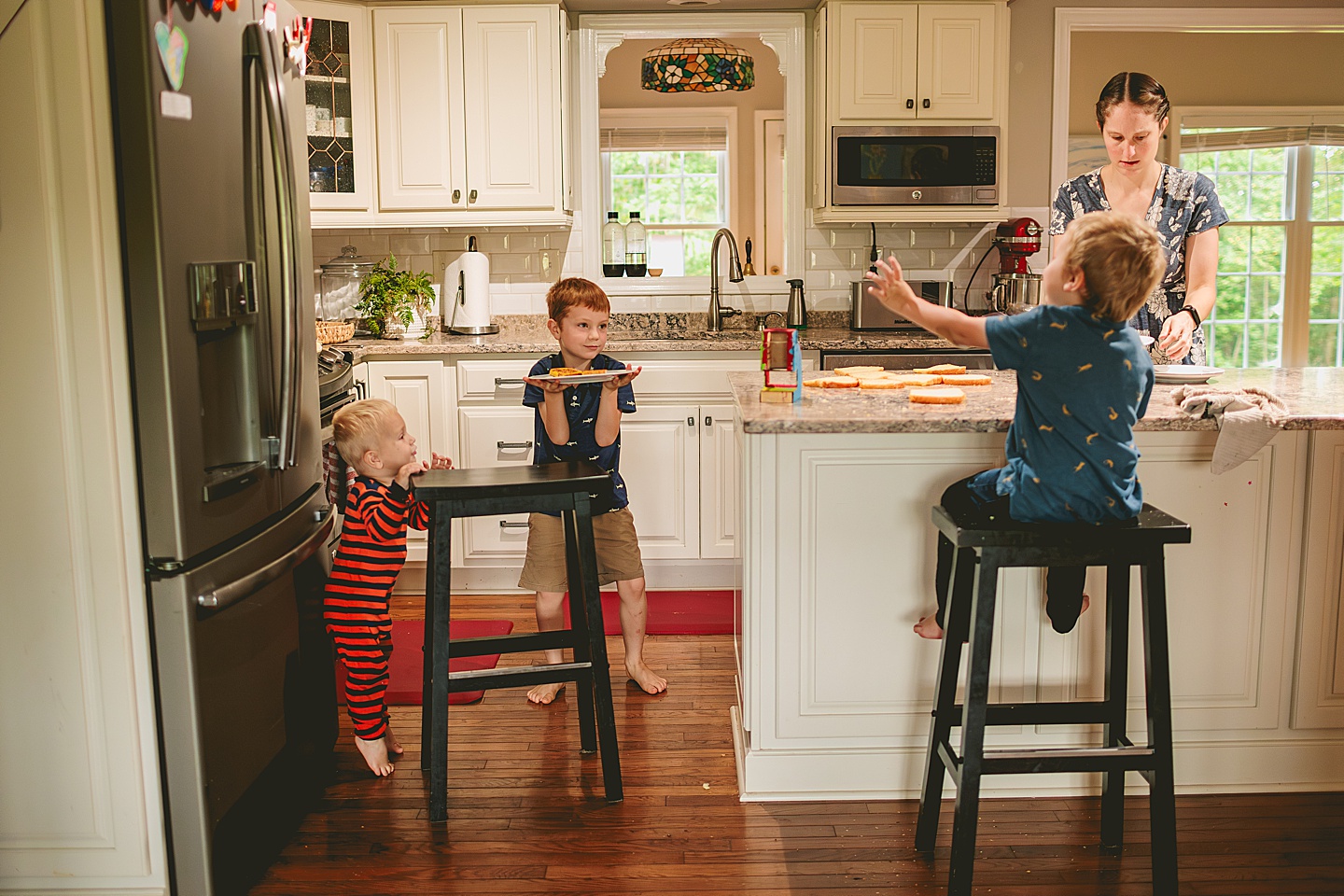 Kids in the kitchen making french toast for photos