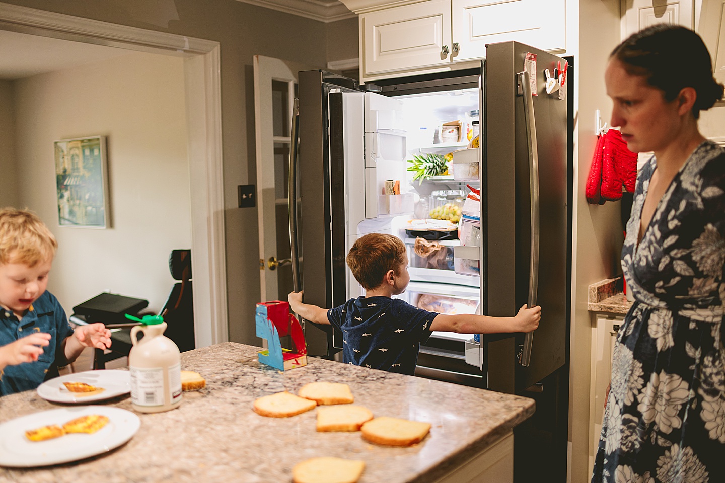 Kids in the kitchen making french toast for photos