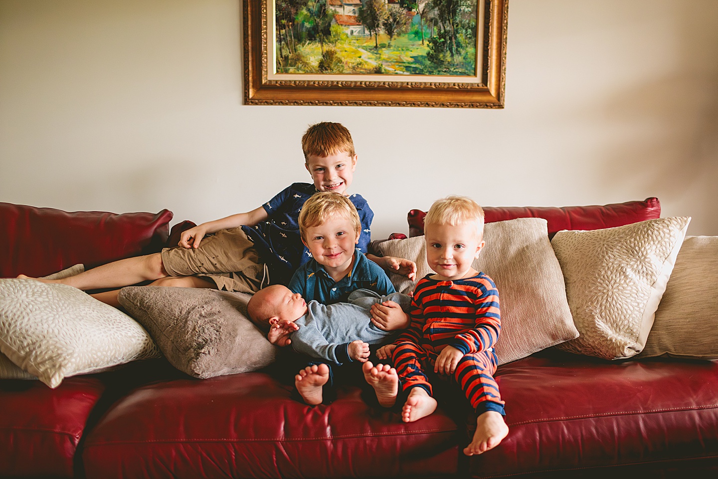 Brothers get portrait taken together on couch