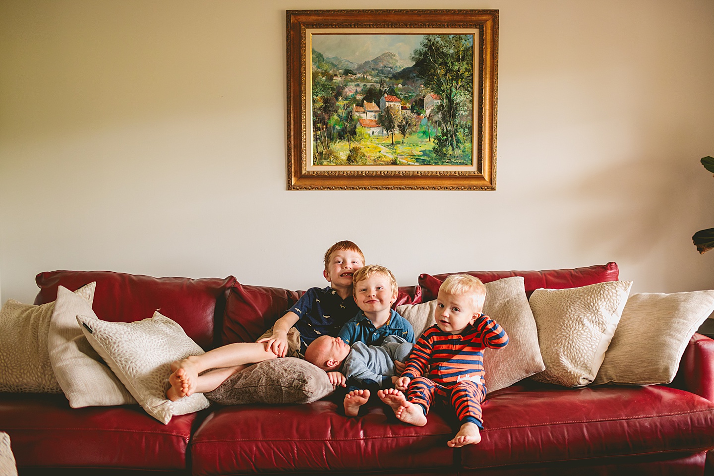 Brothers get portrait taken together on couch